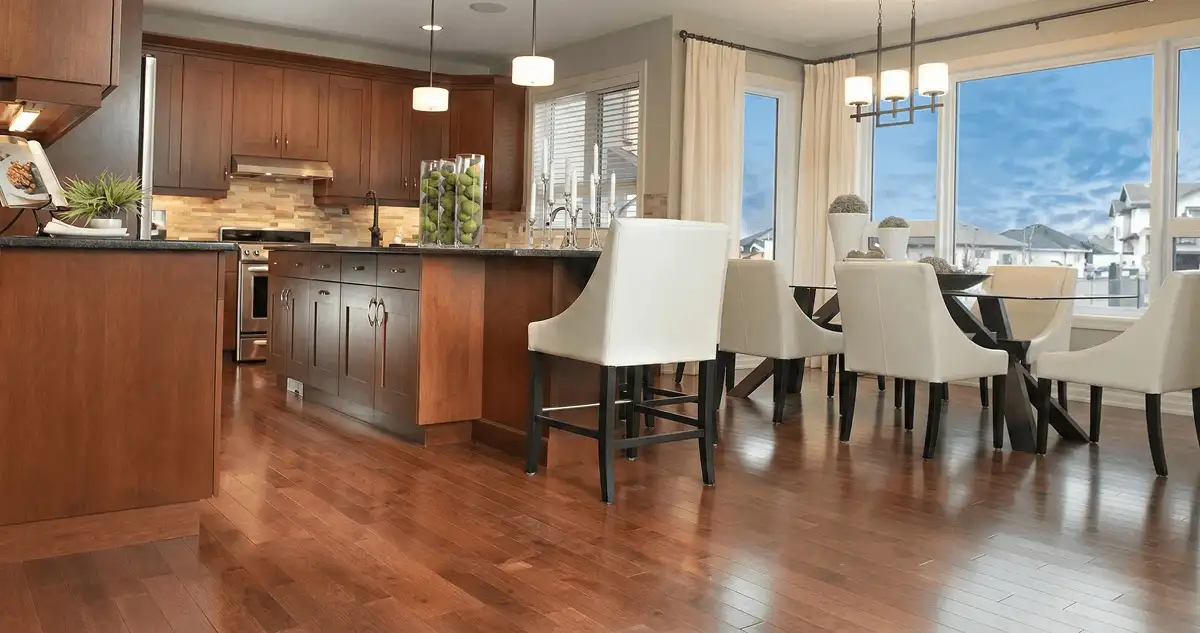 A modern kitchen with professionally installed wood flooring in Anchorage, AK
