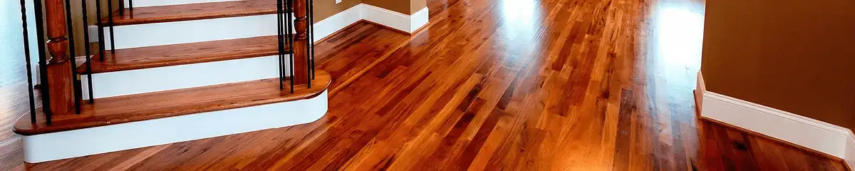 Base floor of a staircase with professionally restored wood flooring in Anchorage AK