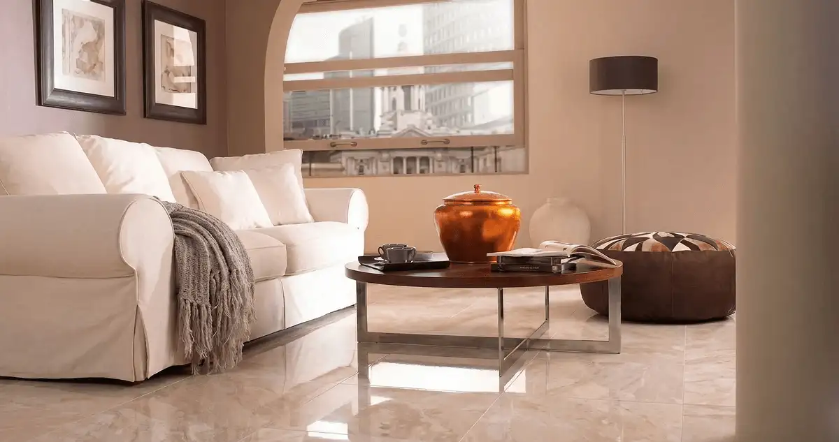 Modern living room with professionally installed marble flooring, a beige sofa, coffee table in Anchorage, AK